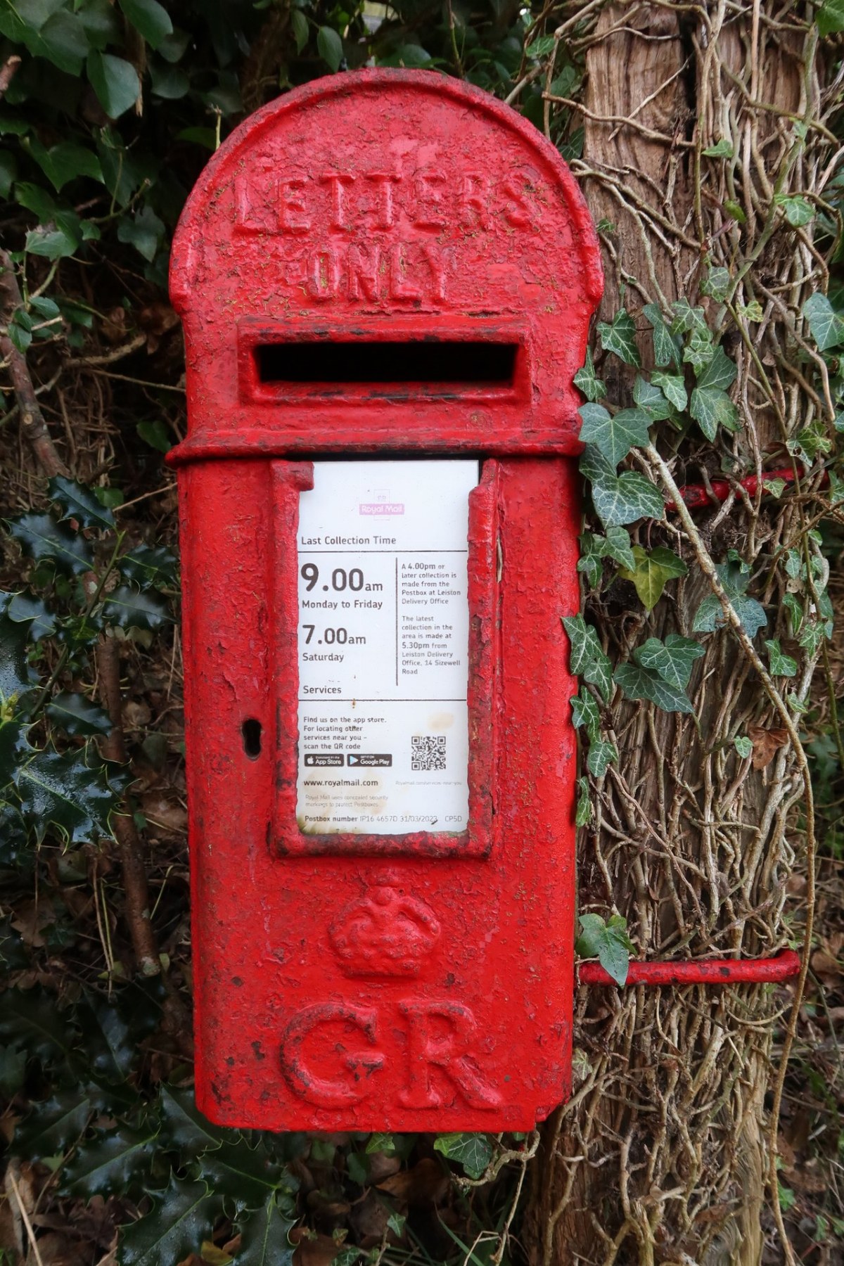 Rounded loaf-shaped top (the collector "Hovis" nickname). George V lamp LB206 on a pole: Church Lane, Aldringham, Suffolk. The same cast shape also exists as a wall box in places; pick Wall box vs Lamp box from the form, not from the loaf crown alone.